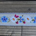 Käsitöötikandiga linane vöö