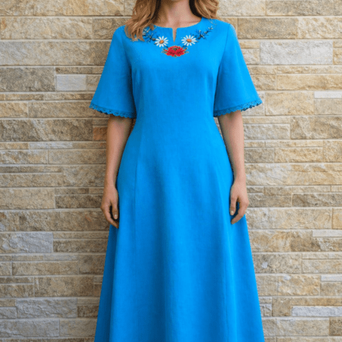 Linane türkiissinine Muhu käsitöötikandiga kleit. Eesti käsitöö. Muhu lilletikand. Rahvuslik kleit.